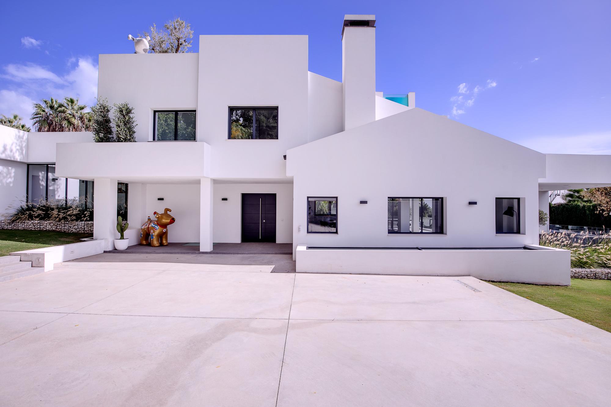 Entrance elevation of Casa Amigos with its gabled roof