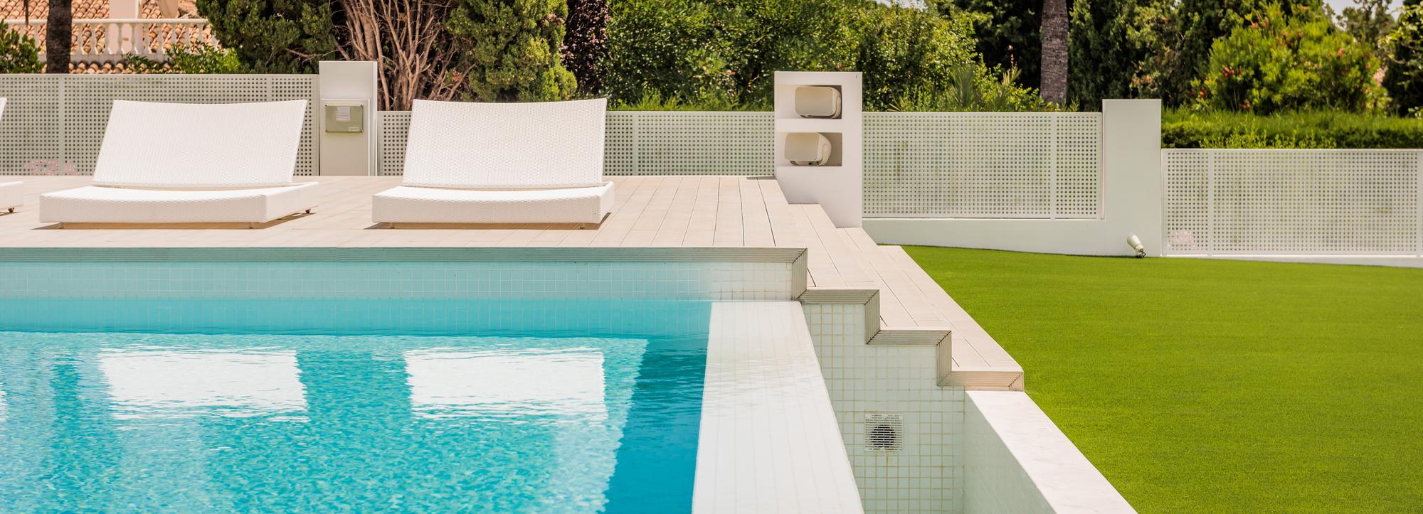 Pool and sun deck at Villa El Pilar